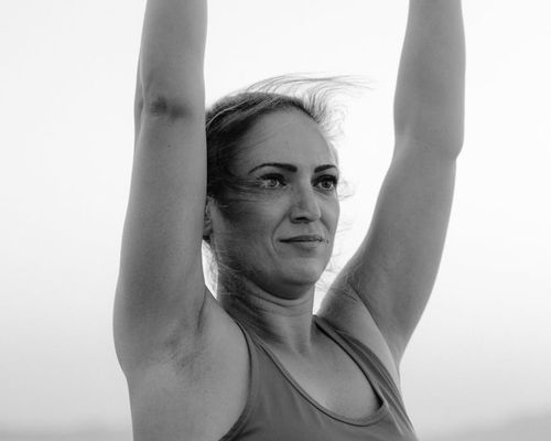 Close up of a woman doing stretching in the morning.